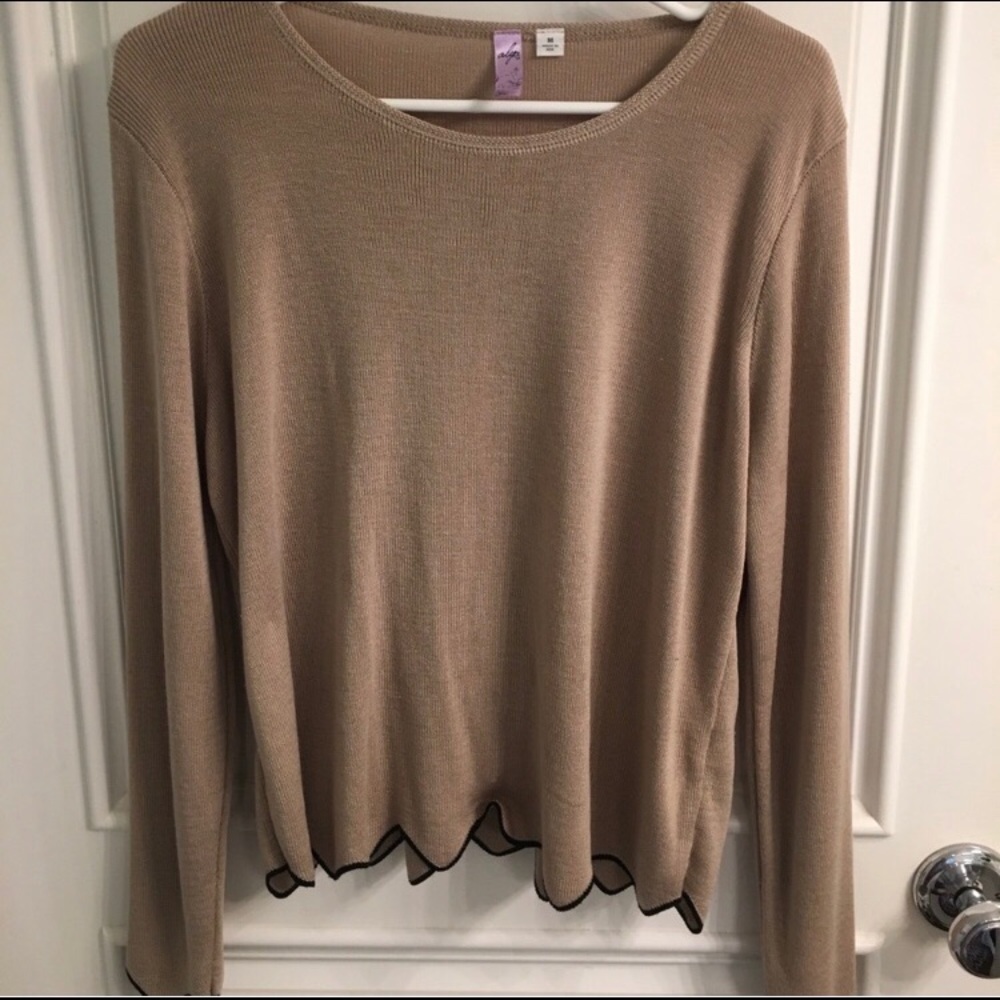 Francesca’s tan sweater with black scallop trim